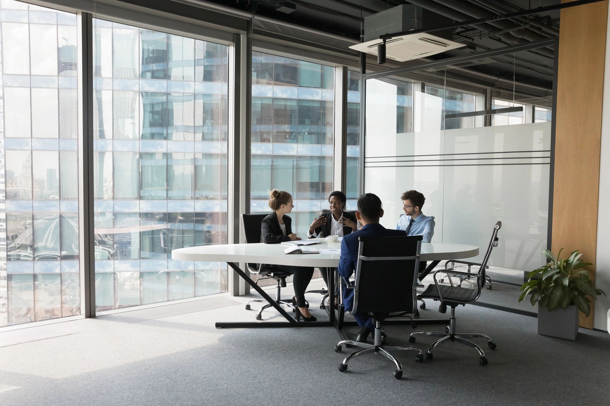 Business team discussing workforce planning in a meeting room