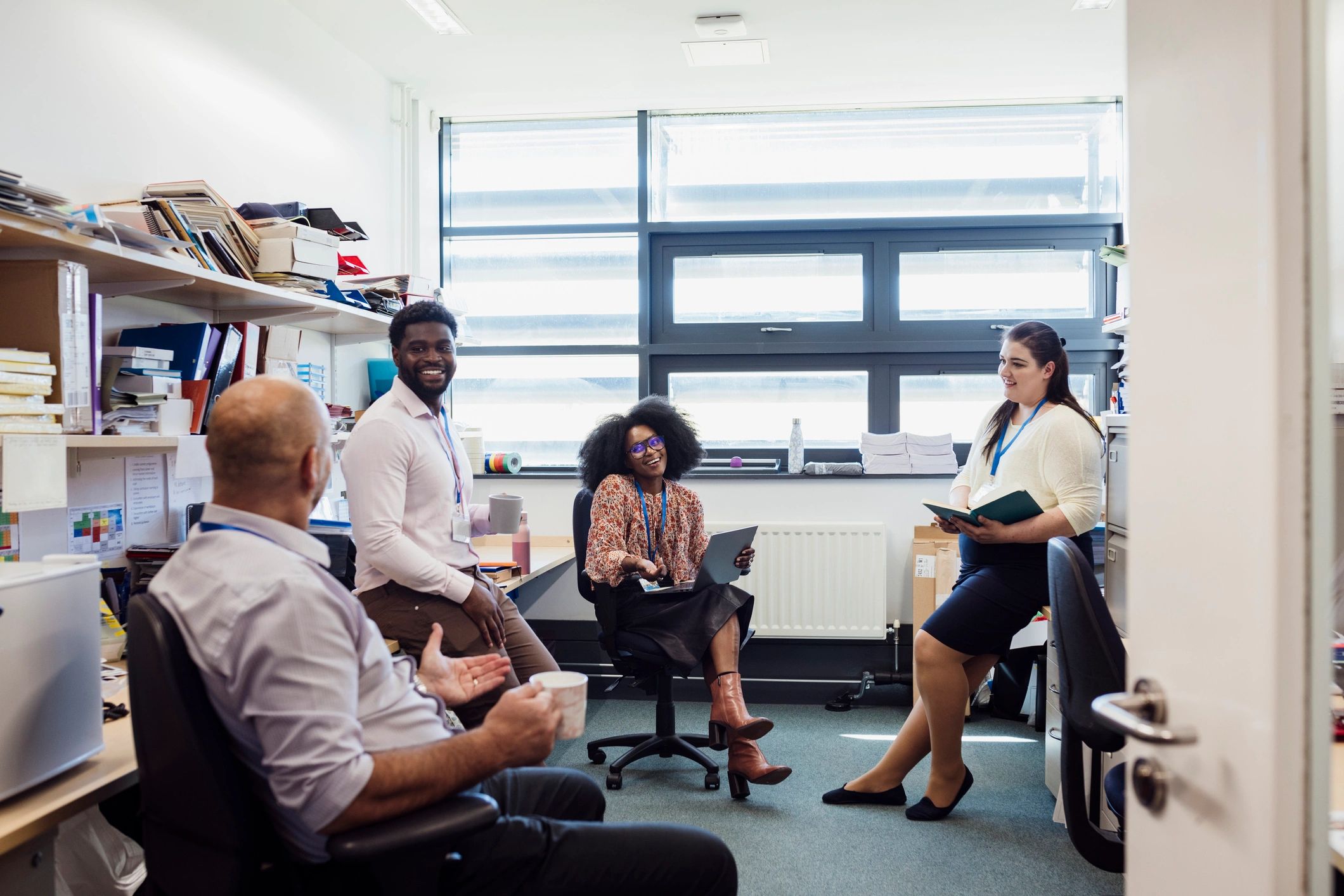 Professional team discussing work in an office